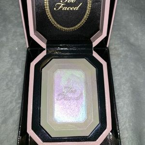 never used Too Faced diamond light highlighter